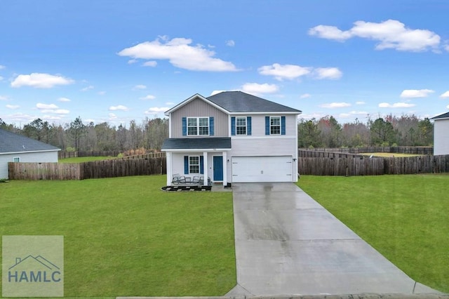 traditional-style house featuring concrete driveway, an attached garage, fence, and a front lawn