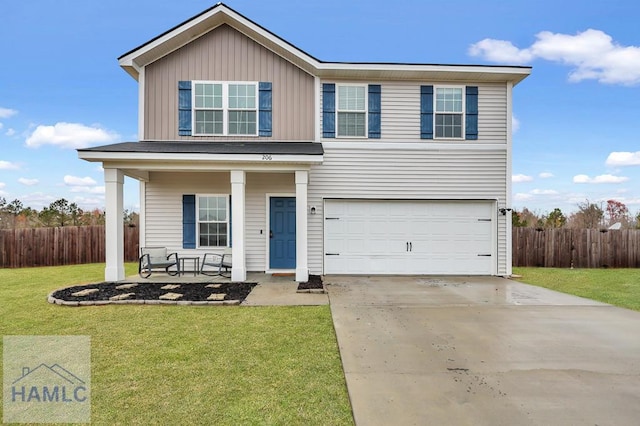 traditional-style house with a front lawn, concrete driveway, fence, and a porch