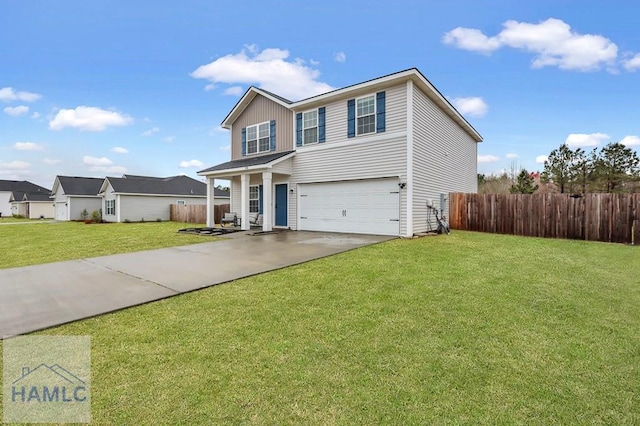 traditional-style home featuring concrete driveway, fence, a garage, and a front lawn