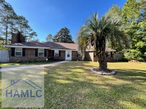 single story home featuring a front yard