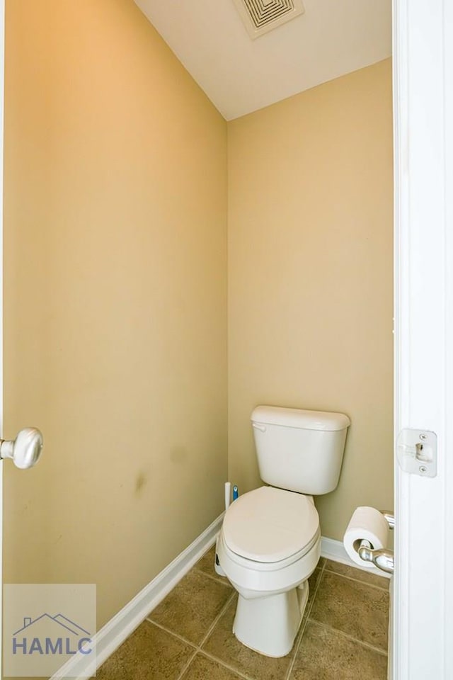 bathroom featuring toilet