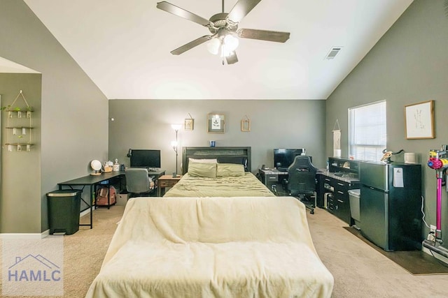 carpeted bedroom with fridge, lofted ceiling, and ceiling fan