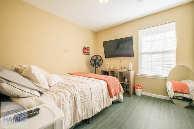 bedroom featuring hardwood / wood-style flooring