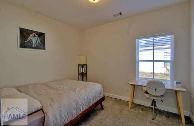 bedroom featuring carpet flooring