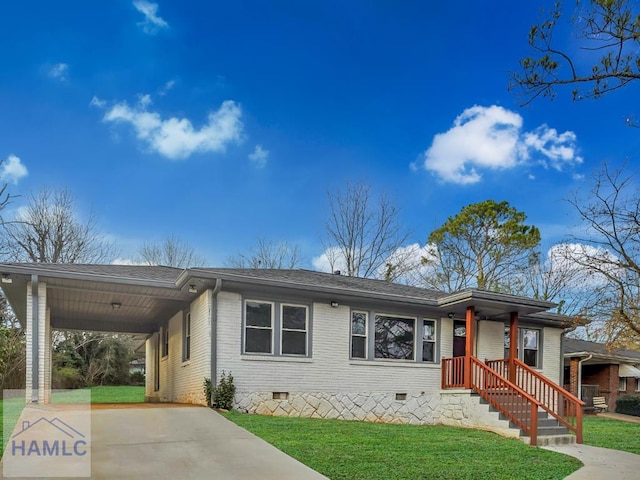 single story home with an attached carport, brick siding, concrete driveway, crawl space, and a front yard