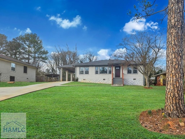 single story home featuring a carport, a front yard, crawl space, and driveway