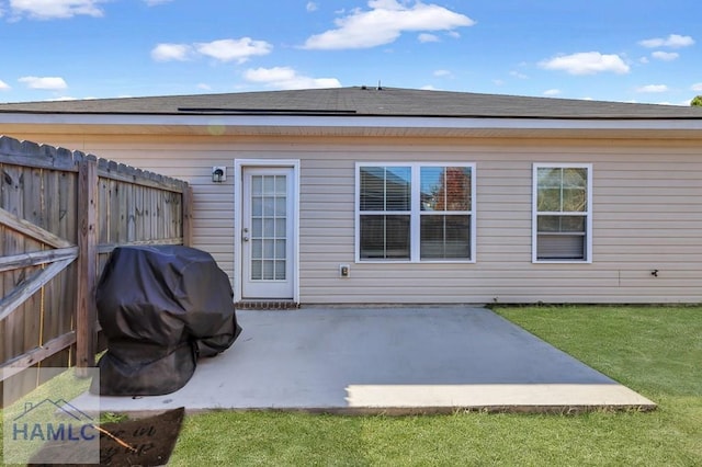 rear view of property with a patio