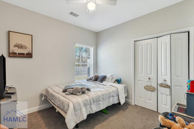 bedroom with ceiling fan, a closet, and carpet