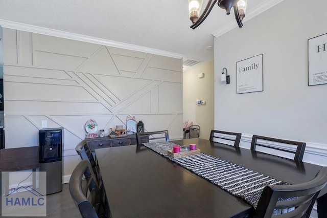 dining room with crown molding