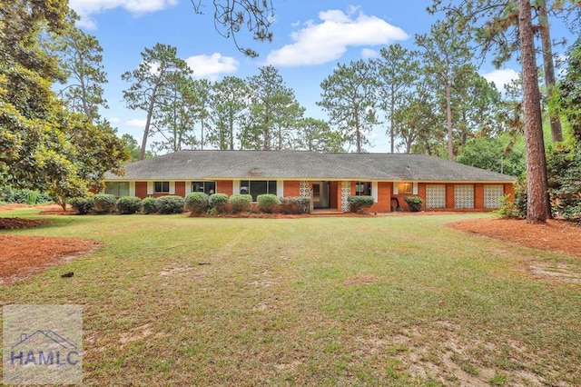 336 Bryant Boyette Rd, Bristol, GA 31518 - ranch-style home featuring a front lawn