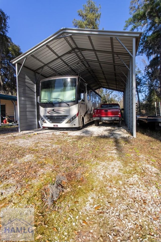 view of car parking with a detached carport