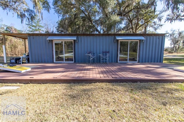 rear view of house with a deck