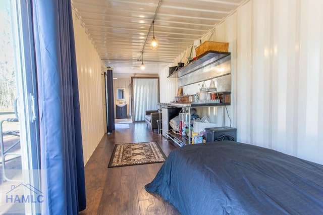 bedroom featuring wood finished floors