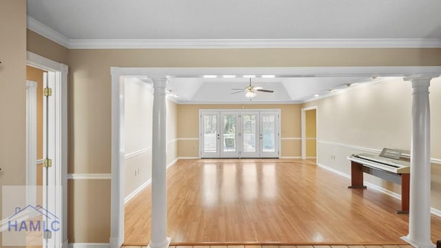 7 S Lake Dr, Jesup, GA 31546 - unfurnished living room featuring wood finished floors, ornamental molding, baseboards, decorative columns, and ceiling fan