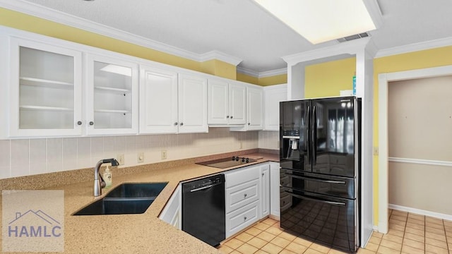 7 S Lake Dr, Jesup, GA 31546 - kitchen featuring decorative backsplash, a sink, white cabinetry, and black appliances