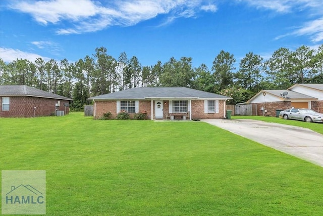 1325 Loblolly Dr, Hinesville, GA 31313 - single story home with concrete driveway, a front lawn, and brick siding