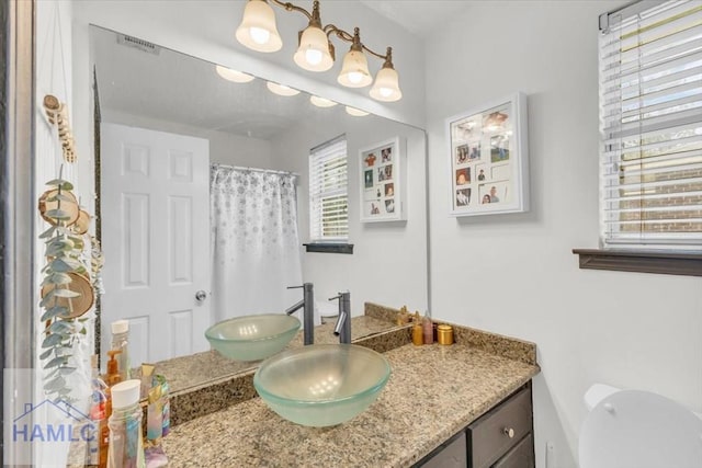 1325 Loblolly Dr, Hinesville, GA 31313 - bathroom featuring vanity and a shower with curtain