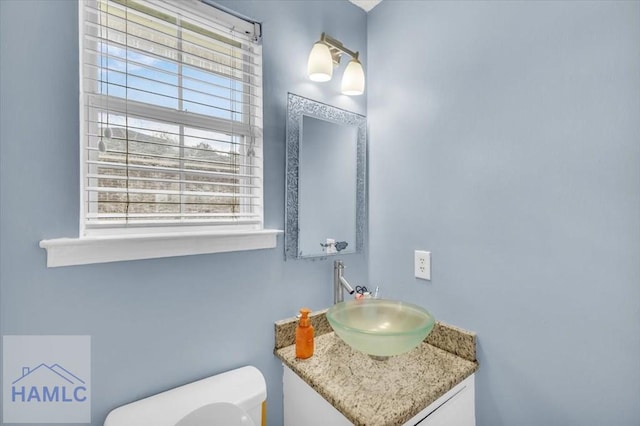 1325 Loblolly Dr, Hinesville, GA 31313 - half bath with vanity and healthy amount of natural light