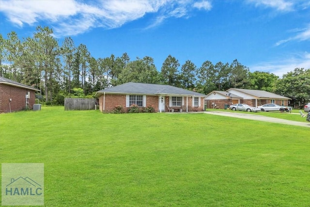 1325 Loblolly Dr, Hinesville, GA 31313 - ranch-style home featuring driveway and a front lawn