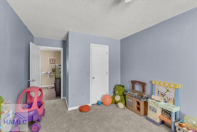 1325 Loblolly Dr, Hinesville, GA 31313 - rec room with carpet flooring and a textured ceiling