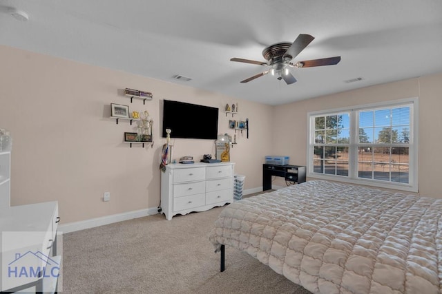 carpeted bedroom with ceiling fan