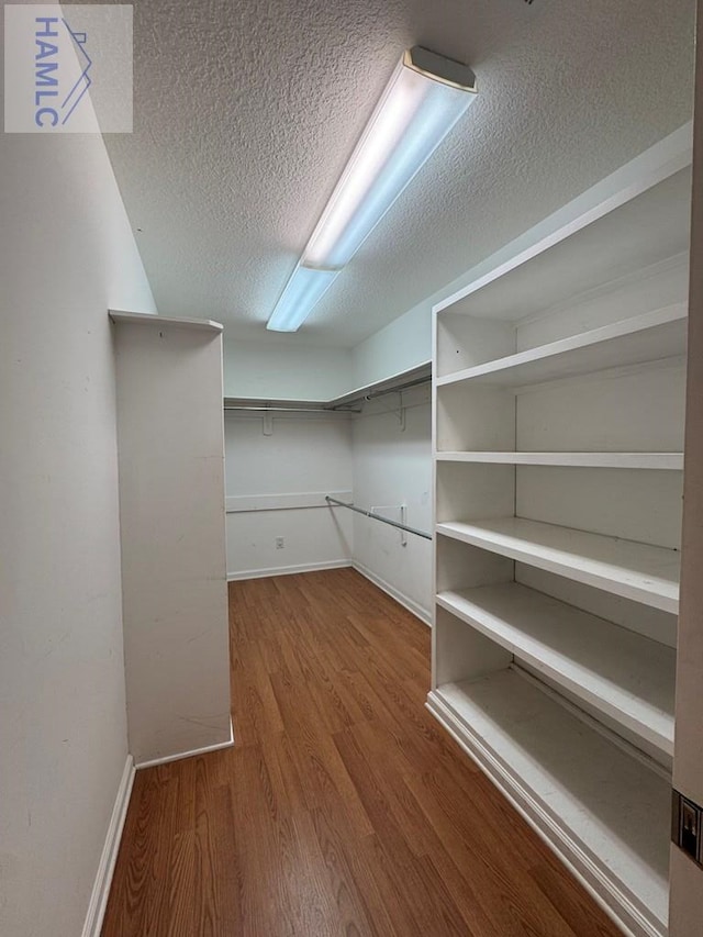 21 Forest Rd, Odum, GA 31555 - spacious closet featuring wood finished floors