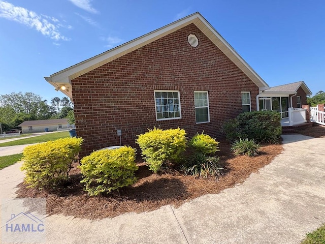 21 Forest Rd, Odum, GA 31555 - view of home's exterior with brick siding