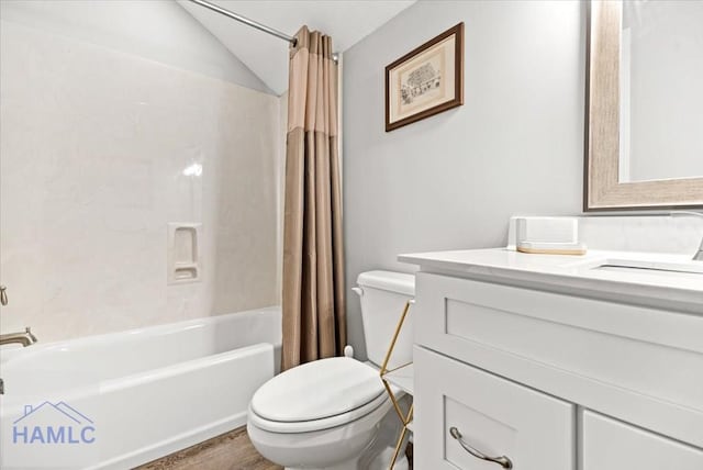 full bathroom with shower / bath combination with curtain, vanity, vaulted ceiling, hardwood / wood-style floors, and toilet