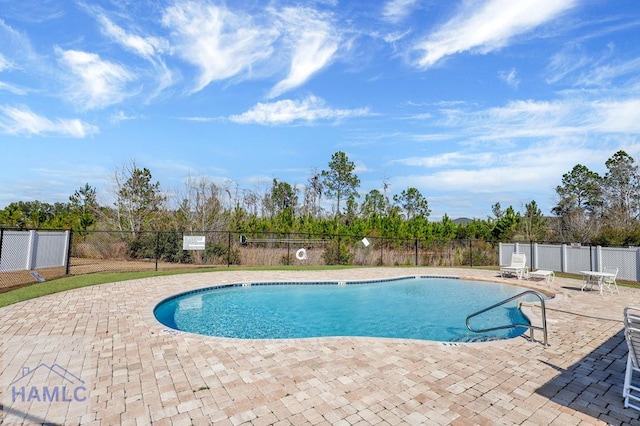 1201 Grayson Ave, Hinesville, GA 31313 - community pool featuring a patio
