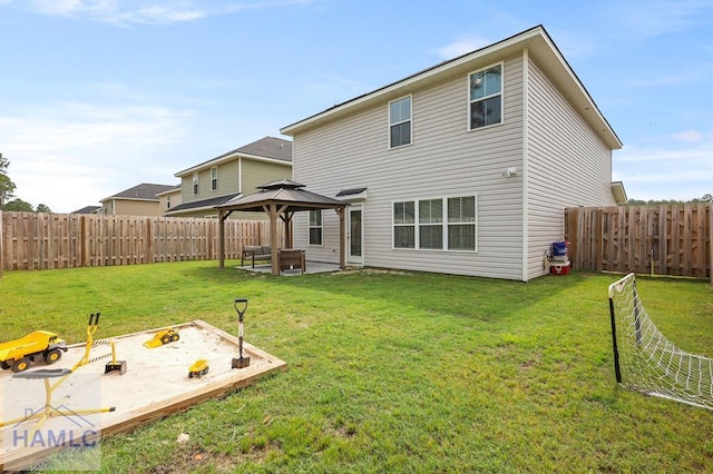 1201 Grayson Ave, Hinesville, GA 31313 - rear view of property with a gazebo and a patio
