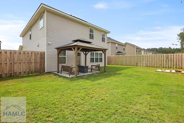 1201 Grayson Ave, Hinesville, GA 31313 - rear view of property with a gazebo, a patio area, and an outdoor hangout area