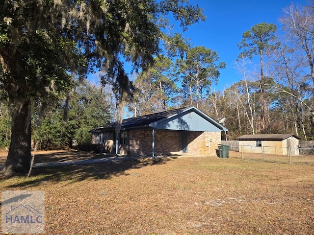 view of property exterior with a lawn