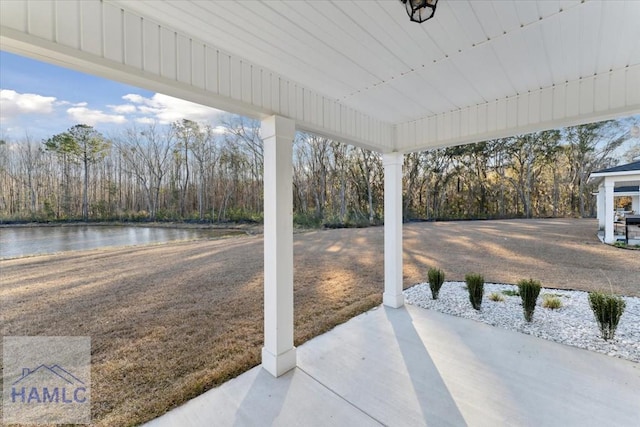 view of patio / terrace featuring a water view