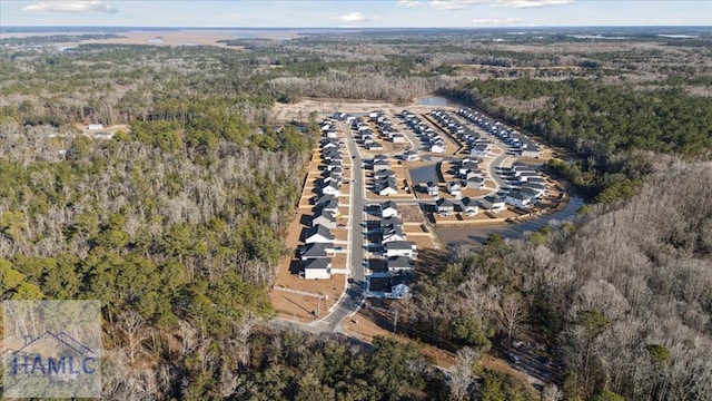 drone / aerial view with a forest view