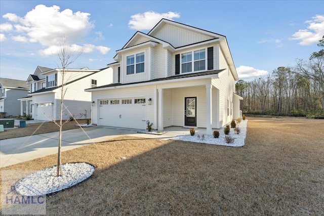 view of front of house featuring a garage and concrete driveway