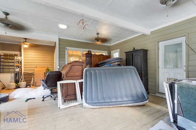 interior space featuring ceiling fan and a wooden deck