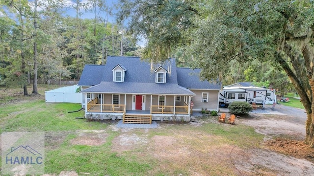 view of front of home with a front lawn and a porch