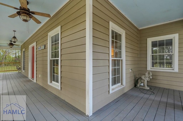 deck featuring ceiling fan and a porch