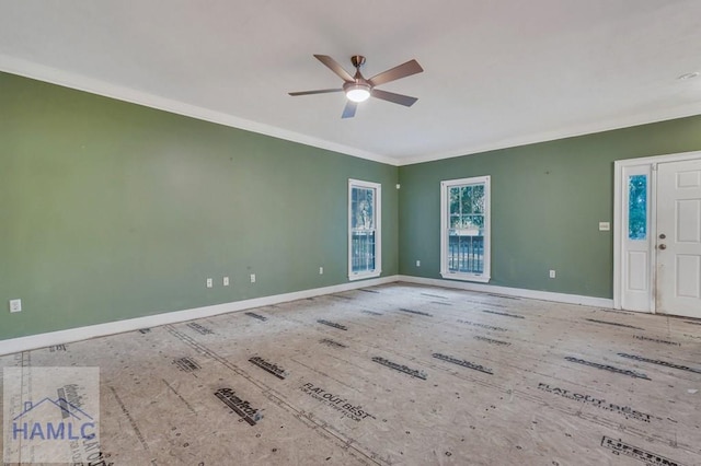 interior space featuring ceiling fan and crown molding