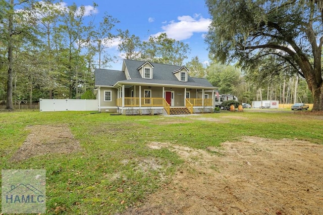 view of front of home featuring a front lawn and covered porch