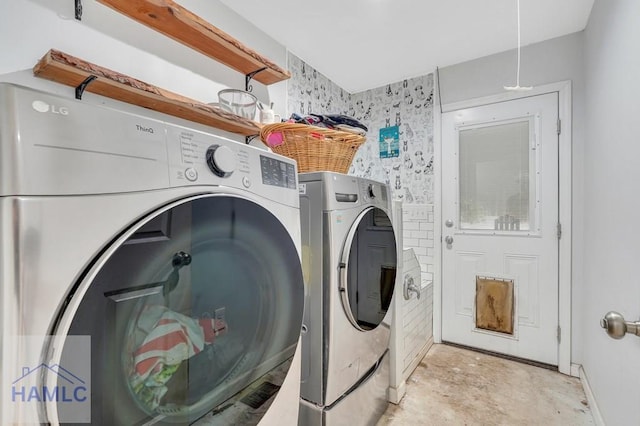 laundry room with washer and dryer