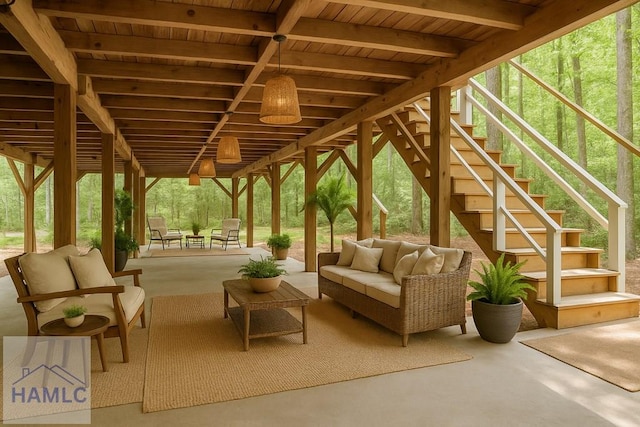 view of patio / terrace with stairway and an outdoor living space