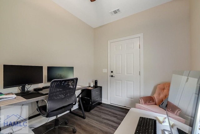 home office with baseboards, visible vents, ceiling fan, and dark wood-type flooring