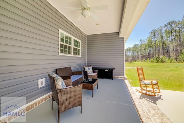 view of patio featuring a ceiling fan