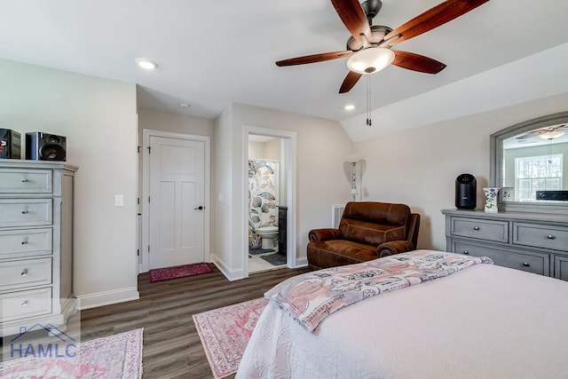 bedroom featuring baseboards, connected bathroom, wood finished floors, vaulted ceiling, and recessed lighting