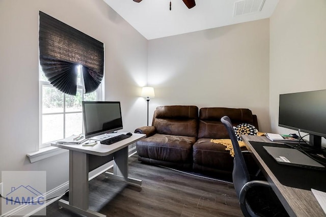 office space with dark wood-style floors, baseboards, visible vents, and a ceiling fan