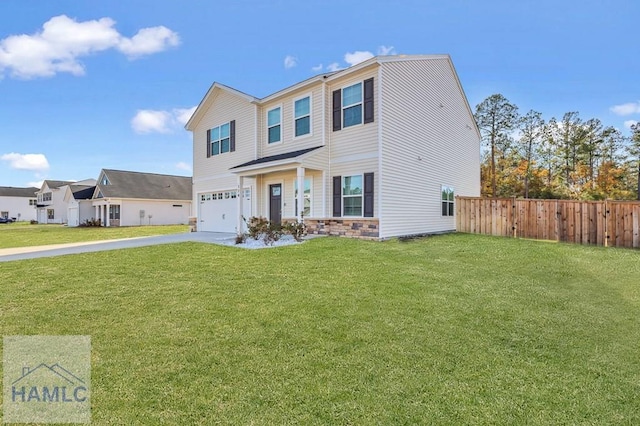 view of front facade with a front lawn and a garage