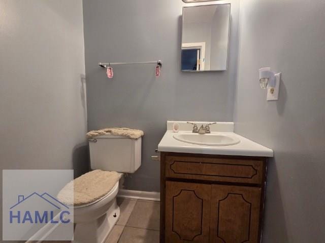 158 Sequoia Cir, Hinesville, GA 31313 - bathroom with vanity, tile patterned flooring, toilet, and baseboards
