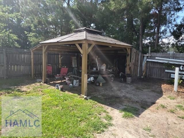 158 Sequoia Cir, Hinesville, GA 31313 - view of outbuilding with a gazebo and fence