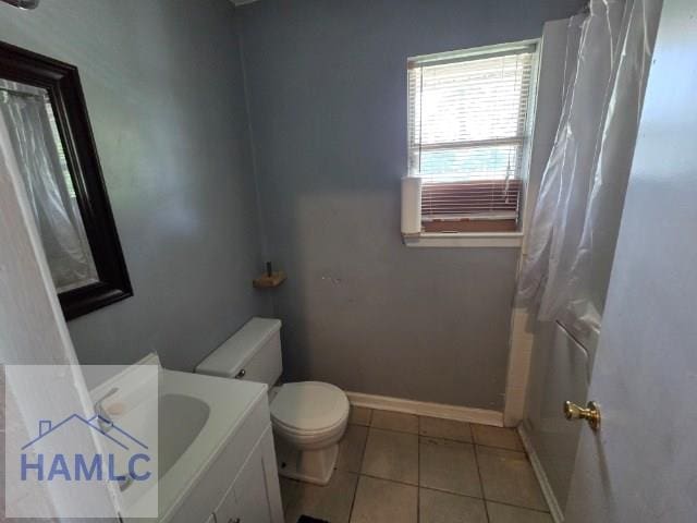158 Sequoia Cir, Hinesville, GA 31313 - full bathroom with toilet, tile patterned flooring, baseboards, vanity, and curtained shower